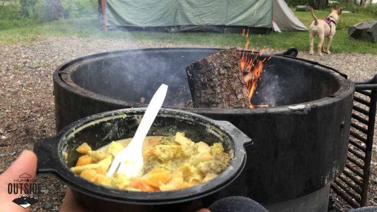 Food by a campfire.